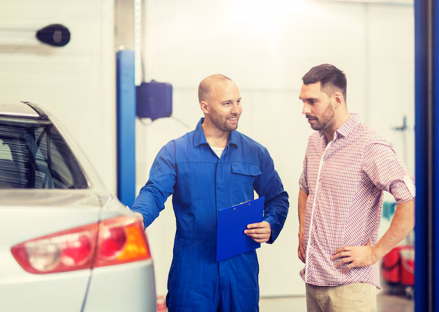 auto-mechanic-with-clipboard-man-car-shop